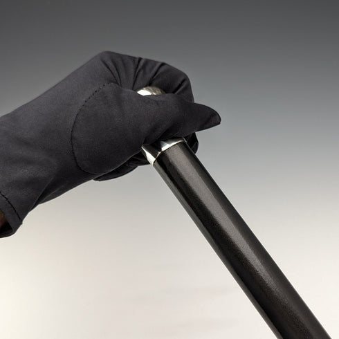 Circa 1925 British vintage gentleman's walking stick, made of sterling silver, round handle, black shaft, 86cm